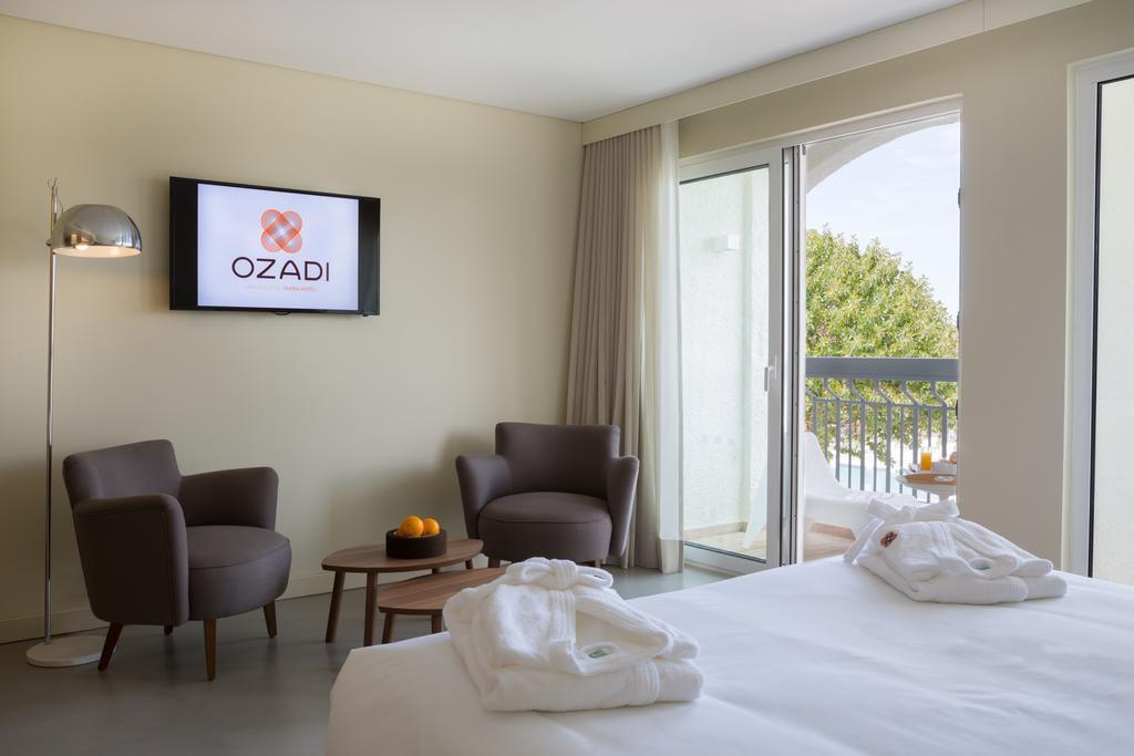Ozadi Tavira Hotel Quarto foto